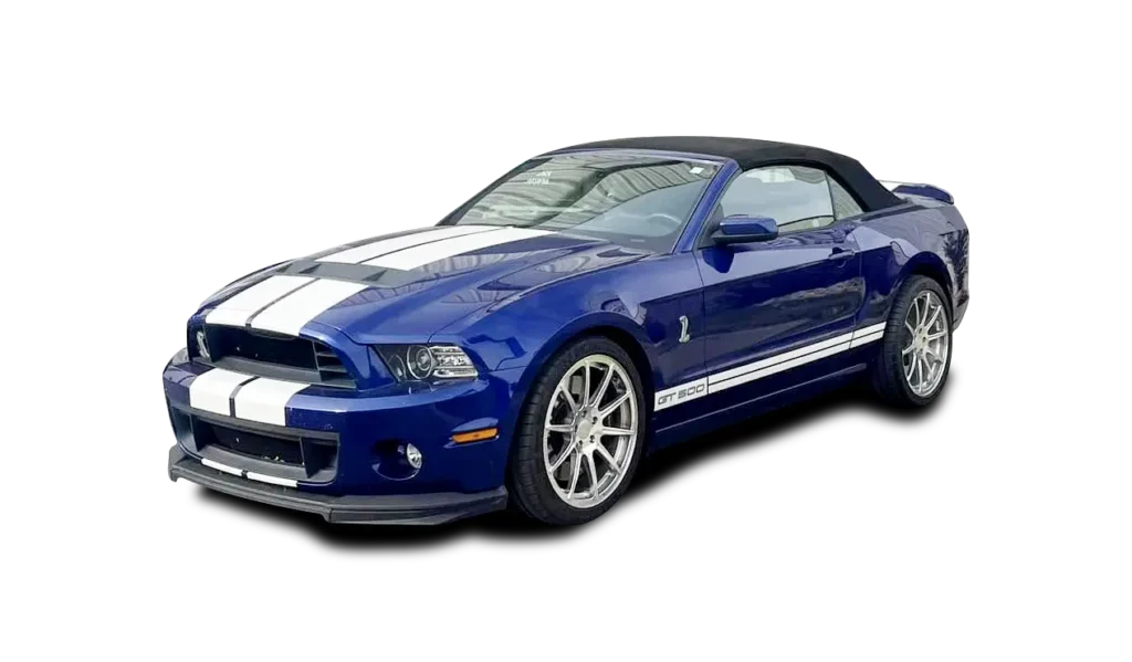 Trusted auto repair shop in Bennington showing an image of blue Ford Mustang convertible with white racing stripes, a black soft top, and silver alloy wheels, viewed from the front left side against a transparent background.