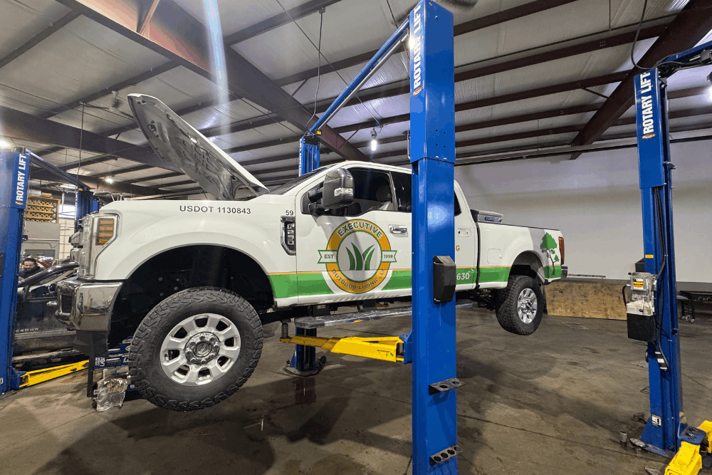 Fleet maintenance in Bennington, NE, at Accelerated Diagnostic and Automotive. Image of heavy-duty pickup on lift showcasing professional inspection, fleet maintenance, and reliable service for peak performance and durability.